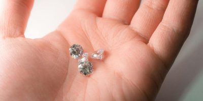 glistening-diamonds-resting-in-the-palm-showcasing-luxury-and-elegance-noN_obXnhYokWSi8cMlmnw